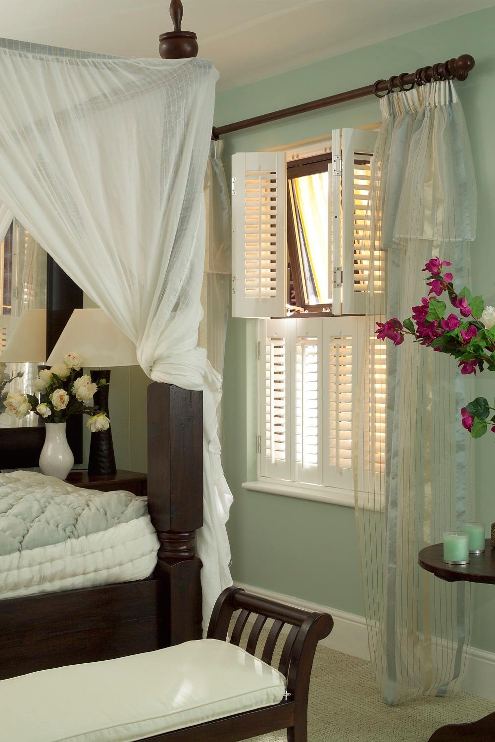 Bedroom with wooden blinds